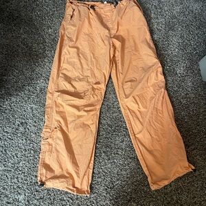 Garage, orange pants, women size large
